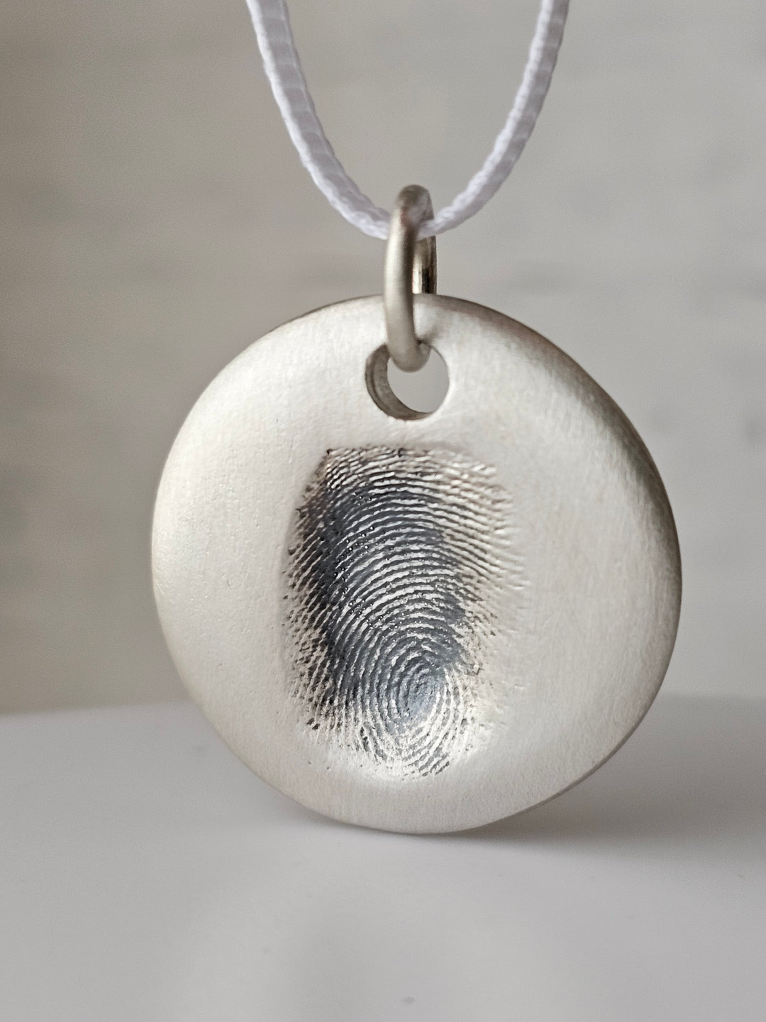 Impression Fingerprint Pebble